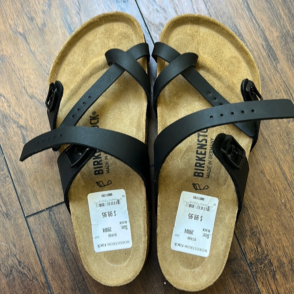 Black Criss Cross Birkenstock sandals. Size 8.5